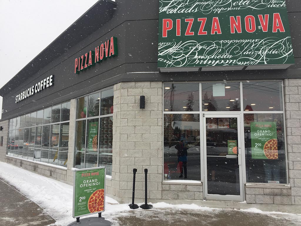 The exterior of a new Pizza Nova pizza shop